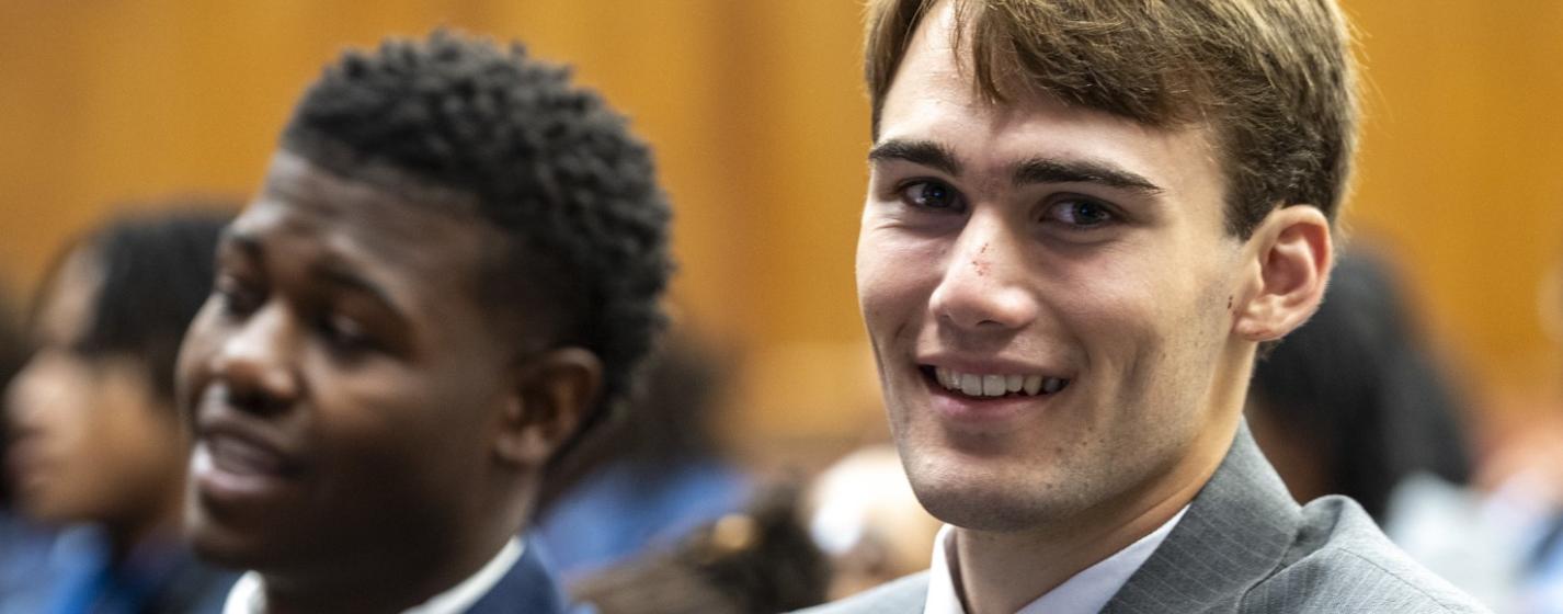 Two people smiling