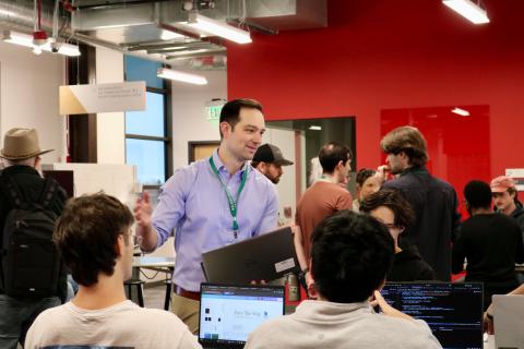 Students asking AI fellow at USDA (Kyle Psilopoulos) for technical advice and guidance on their approach
