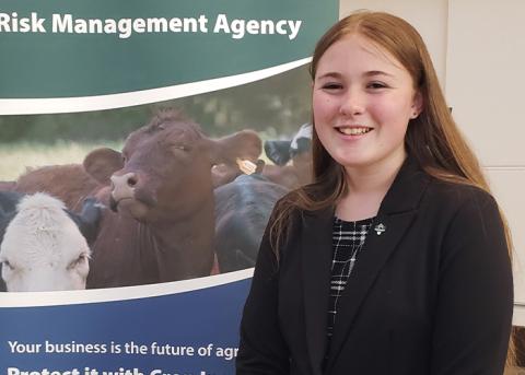 Kaycie Hollrah, Missouri Extension and 4-H Representative, at the USDA Risk Management Agency booth