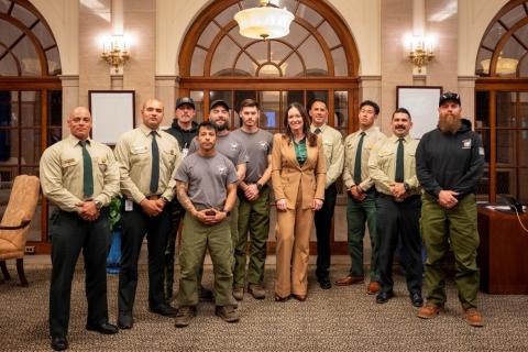 U.S. Secretary of Agriculture Brooke Rollins with U.S. Forest Service wildland firefighters