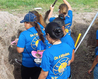 Students digging